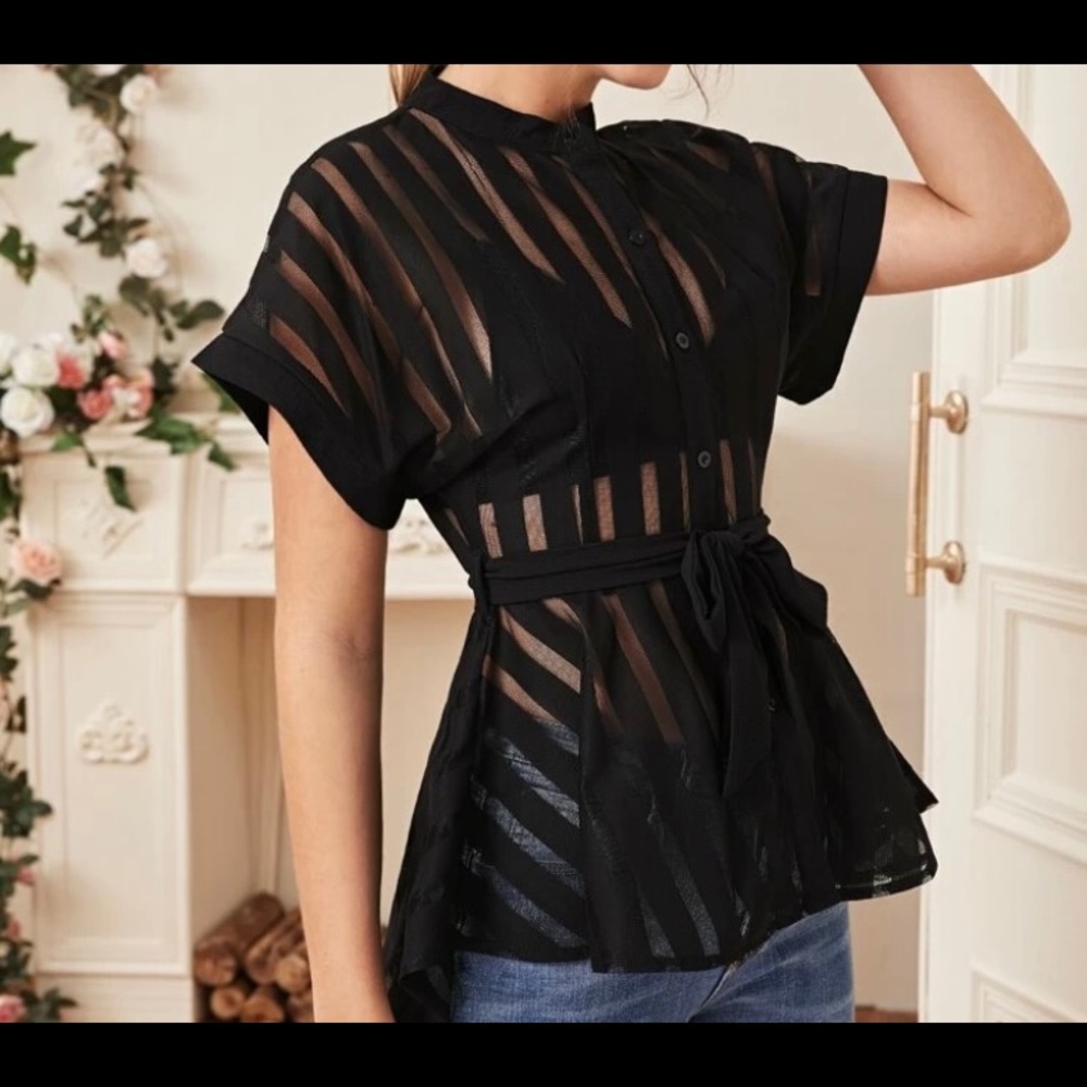 Black peplum blouse.